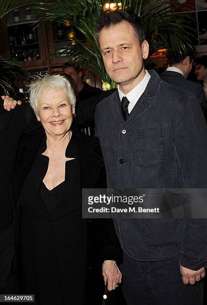 Dame Judi Dench and Michael Grandage attend an after party following the press night performance of 'Peter And Alice' at The National Cafe on March...
