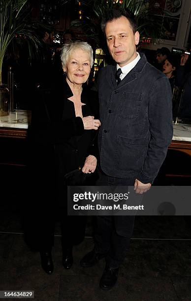 Dame Judi Dench and Michael Grandage attend an after party following the press night performance of 'Peter And Alice' at The National Cafe on March...