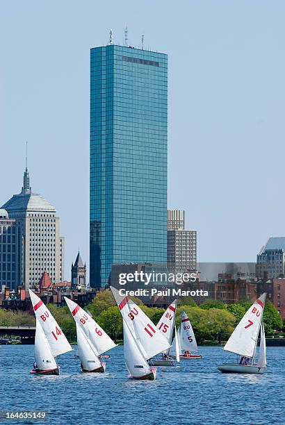 Sail boats on the Charles River with Boston skyline and John Hancock Tower in background on May 1, 2010 in Boston.