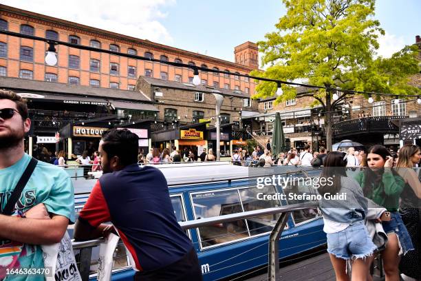 General view of tourists visit the Camden Lock Market at Camden Town district on August 22, 2023 in London, England. London is the capital of...