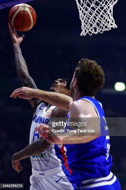 Jordan Clarkson of the Philippines drives to the basket against Nicolo Melli of Italy in the fourth quarter during the FIBA Basketball World Cup...