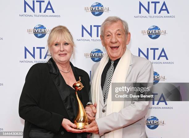 Sarah Lancashire, winner of the Special Recognition award and the Drama Performance award for her work in "Happy Valley", and Sir Ian McKellen pose...
