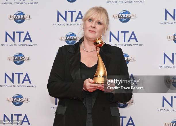 Sarah Lancashire, winner of the Special Recognition award and the Drama Performance award for her work in "Happy Valley", poses in the press room at...