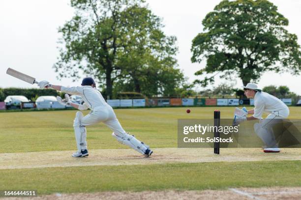 batter missing the ball - championship day two stock pictures, royalty-free photos & images