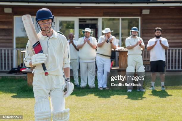 supporting a team member - cricket team stock pictures, royalty-free photos & images