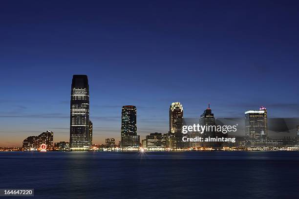 jersey city skyline at night - jersey city stock pictures, royalty-free photos & images