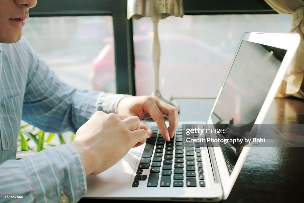 Business man using a laptop computer