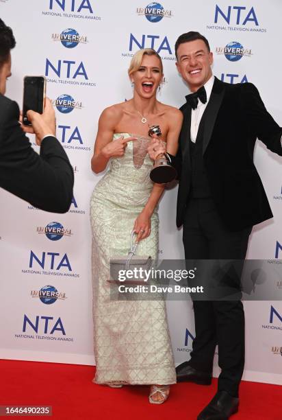 Nadiya Bychkova and Kai Widdrington pose in the press room at the National Television Awards 2023 at The O2 Arena on September 5, 2023 in London,...