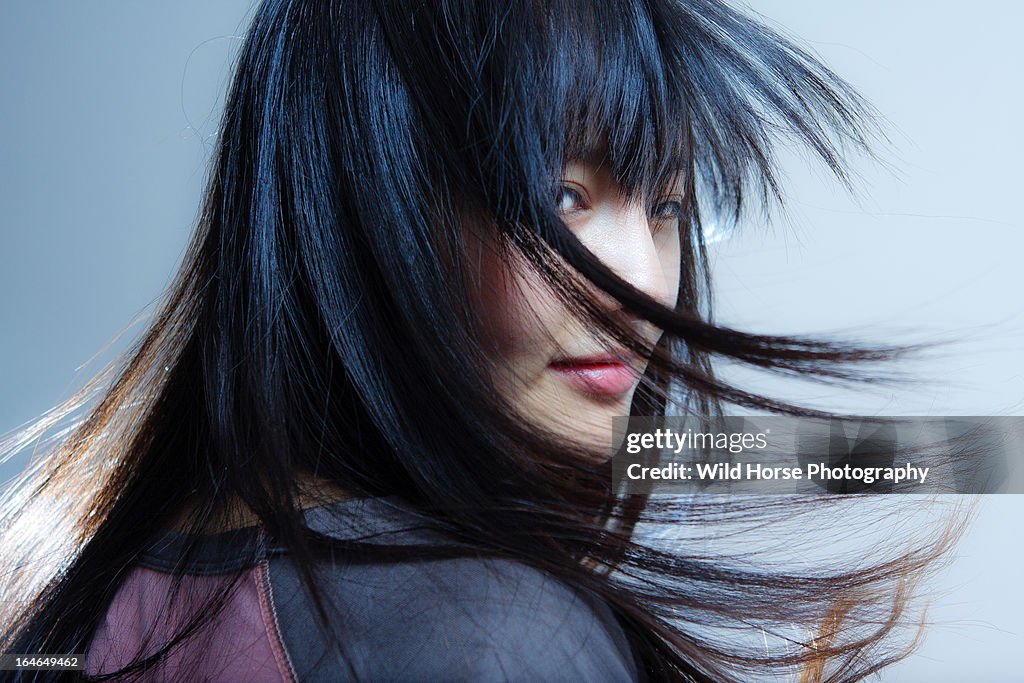 Chinese long hair beauty in wind