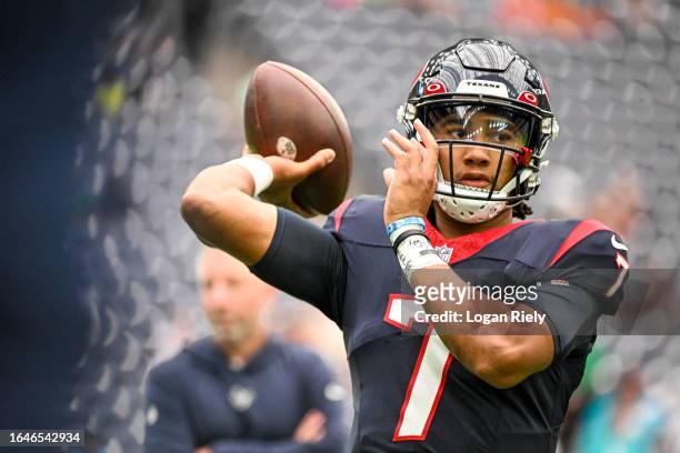 Stroud of the Houston Texans warms up prior to the preseason game against the Miami Dolphins at NRG Stadium on August 19, 2023 in Houston, Texas.