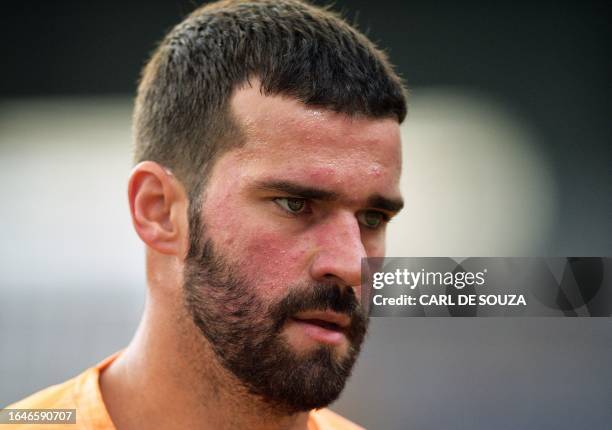 Brazil's goalkeeper Alisson is seen during a training session at the Mangueirao stadium in Belem, Para State, Brazil, on September 5 ahead of their...