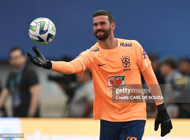 Brazil's goalkeeper Alisson is seen during a training session at the Mangueirao stadium in Belem, Para State, Brazil, on September 5 ahead of their...