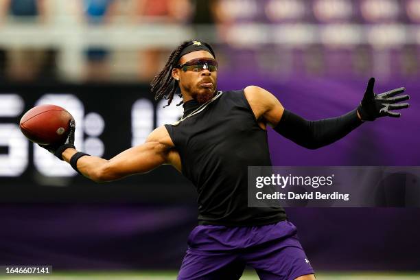 Justin Jefferson of the Minnesota Vikings warms up prior to the start of a preseason game against the Arizona Cardinals at U.S. Bank Stadium on...