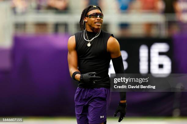 Justin Jefferson of the Minnesota Vikings looks on prior to the start of a preseason game against the Arizona Cardinals at U.S. Bank Stadium on...