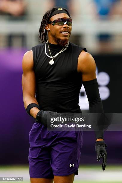 Justin Jefferson of the Minnesota Vikings looks on prior to the start of a preseason game against the Arizona Cardinals at U.S. Bank Stadium on...