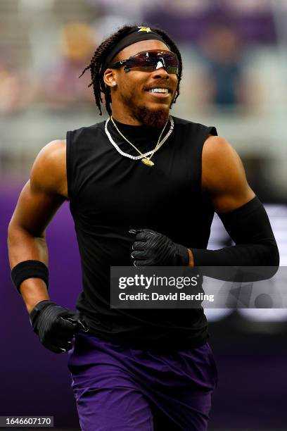 Justin Jefferson of the Minnesota Vikings looks on prior to the start of a preseason game against the Arizona Cardinals at U.S. Bank Stadium on...