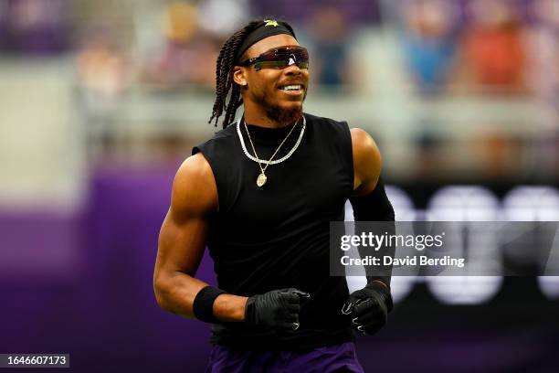 Justin Jefferson of the Minnesota Vikings looks on prior to the start of a preseason game against the Arizona Cardinals at U.S. Bank Stadium on...