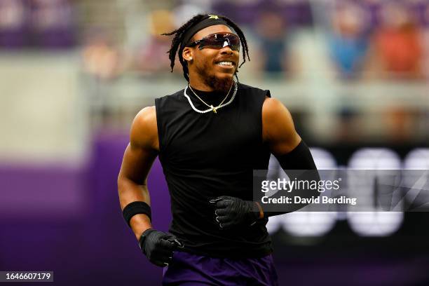 Justin Jefferson of the Minnesota Vikings looks on prior to the start of a preseason game against the Arizona Cardinals at U.S. Bank Stadium on...