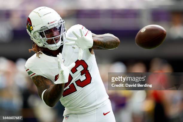 Corey Clement of the Arizona Cardinals warms up prior to the start of a preseason game against the Minnesota Vikings at U.S. Bank Stadium on August...