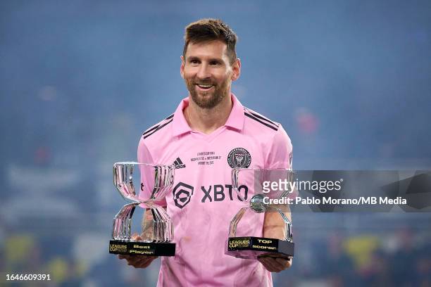 Lionel Messi of Inter Miami poses with his Best Player Award and Top Scorer Award after wining the Leagues Cup final football match against Nashville...