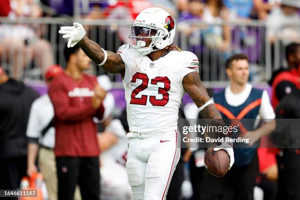 Corey Clement of the Arizona Cardinals celebrates a first down against the Minnesota Vikings in the second half of a preseason game at U.S. Bank...