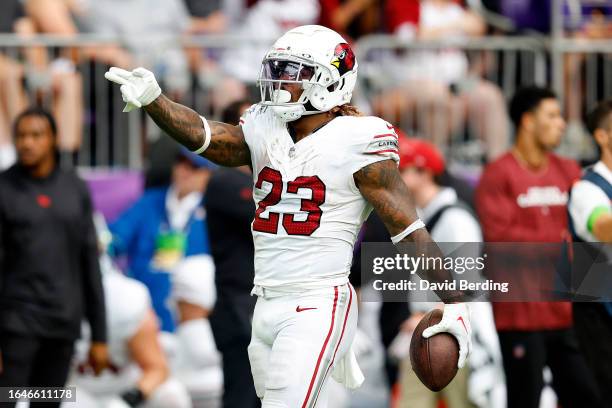 Corey Clement of the Arizona Cardinals celebrates a first down against the Minnesota Vikings in the second half of a preseason game at U.S. Bank...