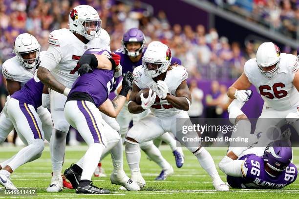 Corey Clement of the Arizona Cardinals runs with the ball against the Minnesota Vikings in the second half of a preseason game at U.S. Bank Stadium...