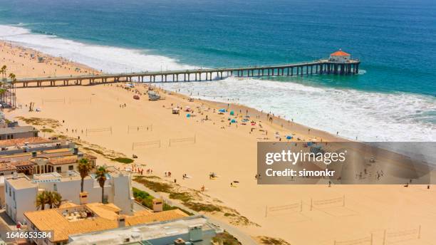 view of huntington beach pier and sea - california pier stock pictures, royalty-free photos & images