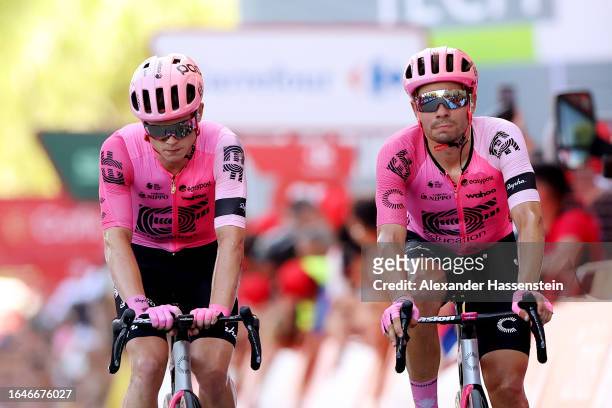 Marijn Van Den Berg of The Netherlands and Stefan Bissegger of Switzerland and Team EF Education-EasyPost cross the finish line during the 78th Tour...