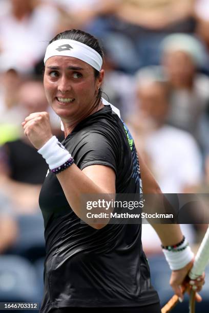 Ons Jabeur of Tunisia reacts against Camila Osorio of Colombia during their Women's Singles First Round match on Day Two of the 2023 US Open at the...