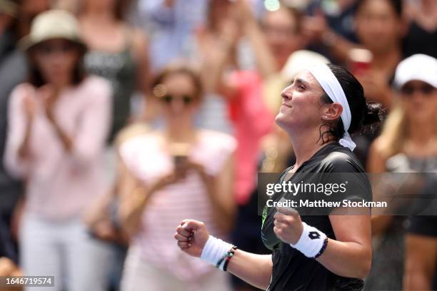 Ons Jabeur of Tunisia celebrates after defeating Camila Osorio of Colombia during their Women's Singles First Round match on Day Two of the 2023 US...