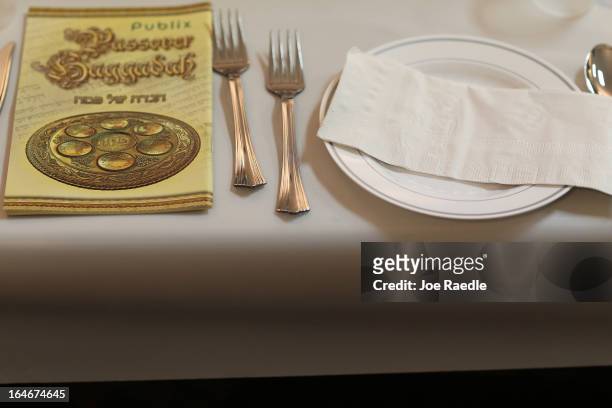 Table is set for a community Passover Seder at Beth Israel synagogue on March 25, 2013 in Miami Beach, Florida. The community Passover Seder that...