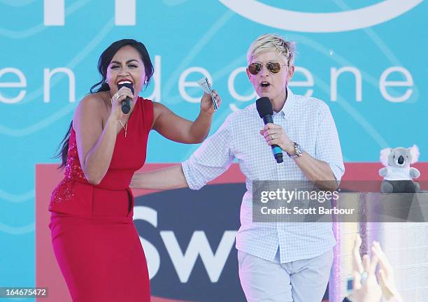 Television personality Ellen DeGeneres appears on stage with Australian singer Jessica Mauboy during the filming of her television show at Birrarung...