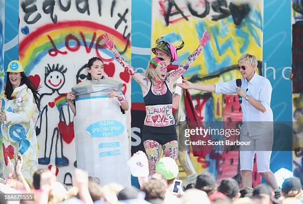 Television personality Ellen DeGeneres appears on stage during the filming of her television show at Birrarung Marr on March 26, 2013 in Melbourne,...