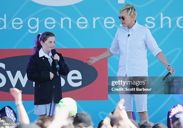 Television personality Ellen DeGeneres appears on stage with schoolgirl Georgia who sung for her during the filming of her television show at...