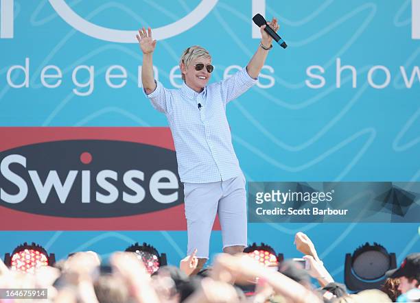 Television personality Ellen DeGeneres dances on stage during the filming of her television show at Birrarung Marr on March 26, 2013 in Melbourne,...