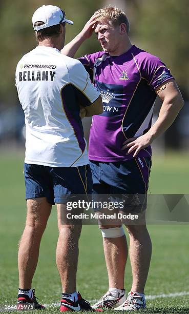 Coach Craig Bellamy talks to Slade Griffen during a Melbourne Storm NRL training session at Gosch's Paddock on March 26, 2013 in Melbourne, Australia.