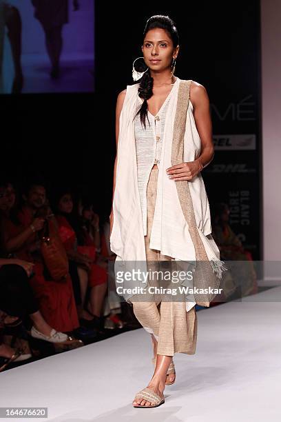 Model showcases designs by Daniel Syiem on the runway during day four of Lakme Fashion Week Summer/Resort 2013 on March 25, 2013 at Grand Hyatt in...