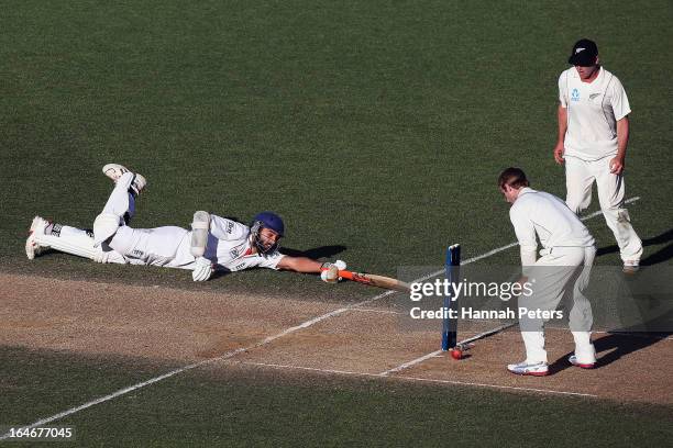 Monty Panesar of England dives into his crease during day five of the Third Test match between New Zealand and England at Eden Park on March 26, 2013...