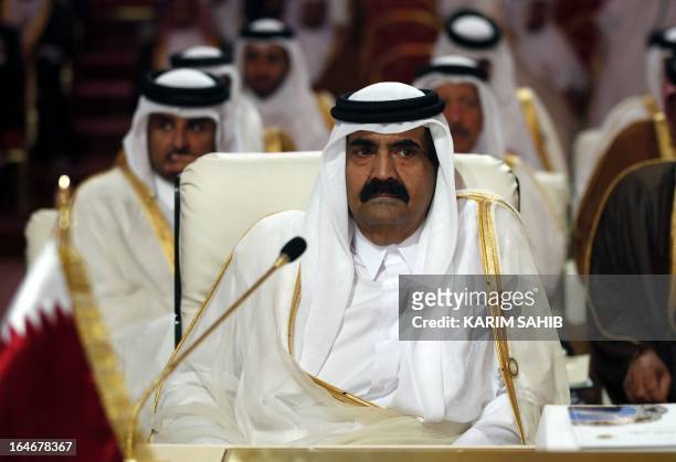 Qatar's Emir Hamad bin Khalifa al-Thani attends the opening of the Arab League summit in the Qatari capital Doha on March 26, 2013. The Arab League...