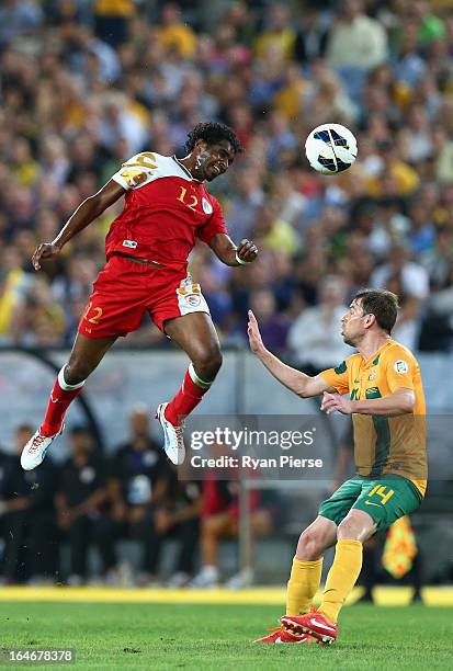 Ahmed Mubarak of Oman competes for the ball against Brett Holman of the Socceroos during the FIFA 2014 World Cup Qualifier match between the...