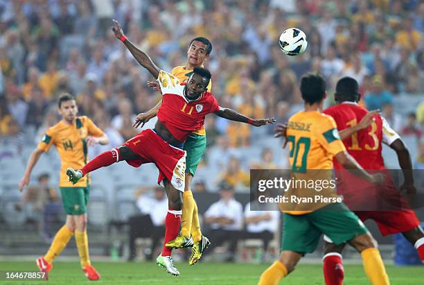 Tim Cahill of the Socceroos scores his team's first goal during the FIFA 2014 World Cup Qualifier match between the Australian Socceroos and Oman at...