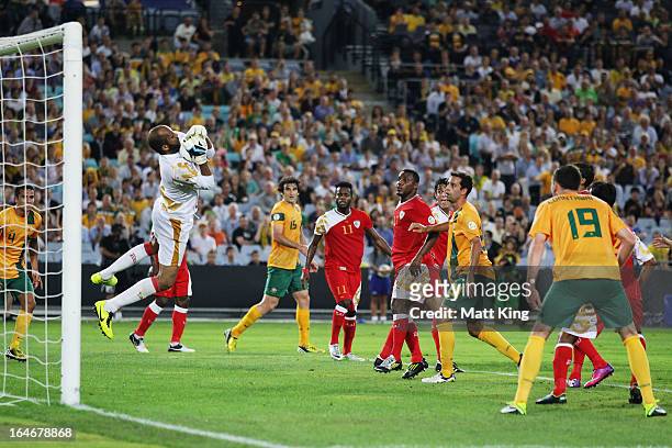 Goalkeeper Ali Habsi of Oman makes a save during the FIFA 2014 World Cup Qualifier match between the Australian Socceroos and Oman at ANZ Stadium on...