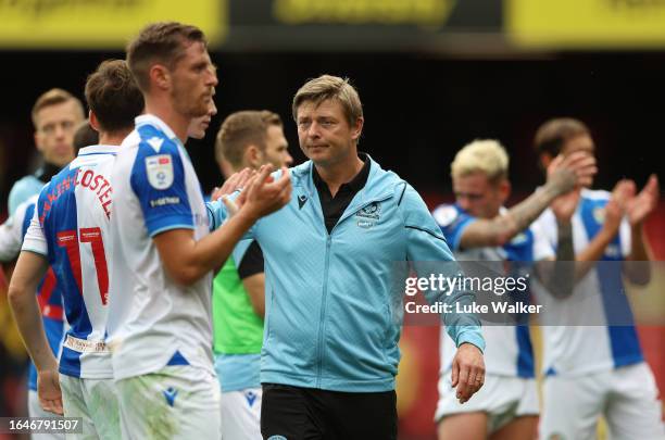 Jon Dahl Tomasson, Head Coach of Blackburn Rovers, celebrates victory with his players at full-time following the Sky Bet Championship match between...