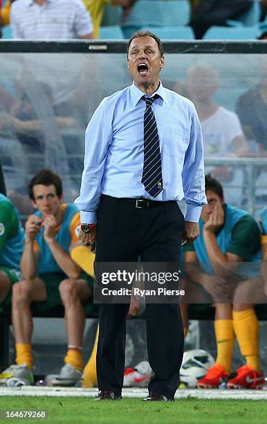 Holger Osieck, coach of the Socceroos, instructs his players during the FIFA 2014 World Cup Qualifier match between the Australian Socceroos and Oman...