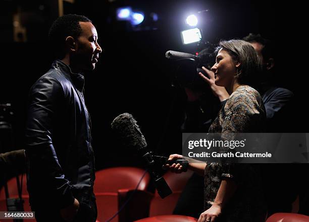 John Legend interviews after a press conference to announce "The Sound Of Change Live", a global concert event, at the Soho Hotel on March 26, 2013...