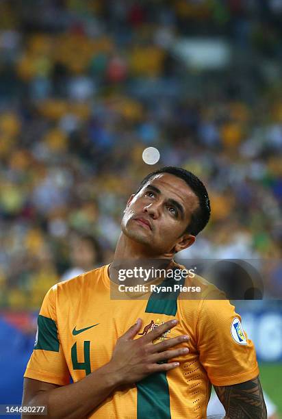 Tim Cahill of the Socceroos looks on during the national anthem during the FIFA 2014 World Cup Qualifier match between the Australian Socceroos and...