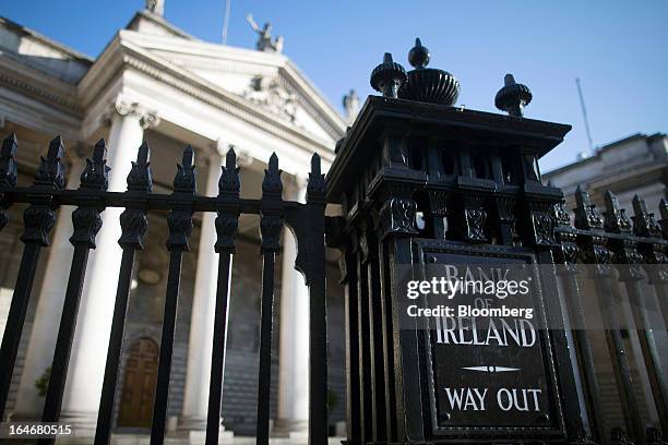 Sign at the Bank of Ireland Plc directing traffic reads 'Way Out' and is seen on the railings outside an entrance to the bank on Dame Street in...