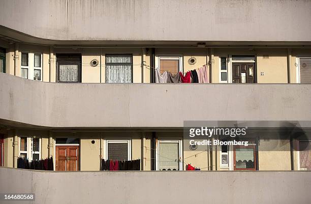 Clothes hang drying on a washing line outside a block of residential flats in Hanover Street East in Dublin, Ireland, on Thursday, March 14, 2013....