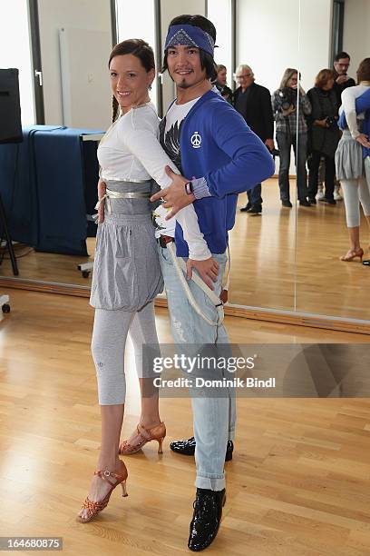 Simone Ballack and Erich Klann pose at a photo call for the sixth season on Germany's RTL network competition 'Let's Dance' on March 26, 2013 in...